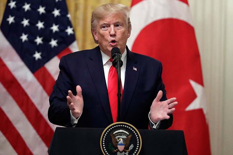 In this Nov. 13, 2019, photo, President Donald Trump speaks during a news conference with Turkish President Recep Tayyip Erdogan in the East Room of the White House in Washington. In a sharply divided country, a new poll finds some things Americans can agree on. There's widespread consensus on the importance of factual information being transparent and based in data, and Democrats and Republicans alike frequently find the current information environment challenging. (AP Photo/ Evan Vucci)