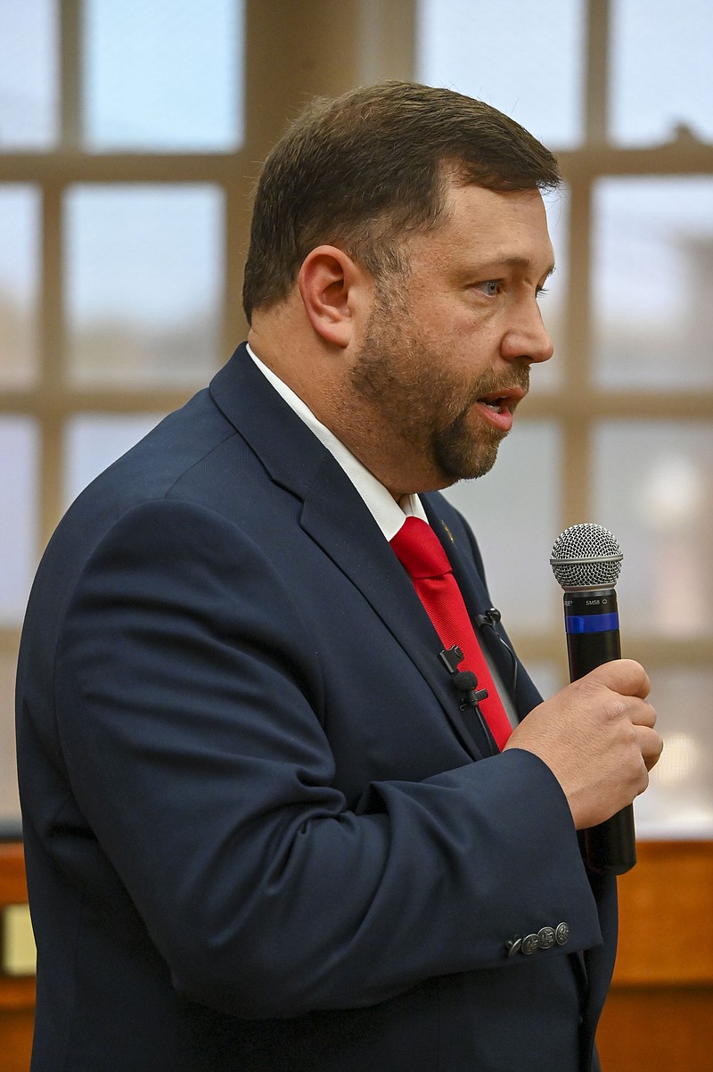 Josh Davis announces his resignation  as a Texarkana, Texas, council member to run for Bowie County tax assessor-collector at a news conference Thursday in Texarkana, Texas.