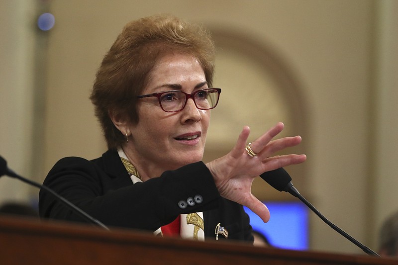 Former U.S. Ambassador to Ukraine Marie Yovanovitch testifies before the House Intelligence Committee on Capitol Hill in Washington, Friday, Nov. 15, 2019, during the second public impeachment hearing of President Donald Trump's efforts to tie U.S. aid for Ukraine to investigations of his political opponents. (AP Photo/Andrew Harnik)