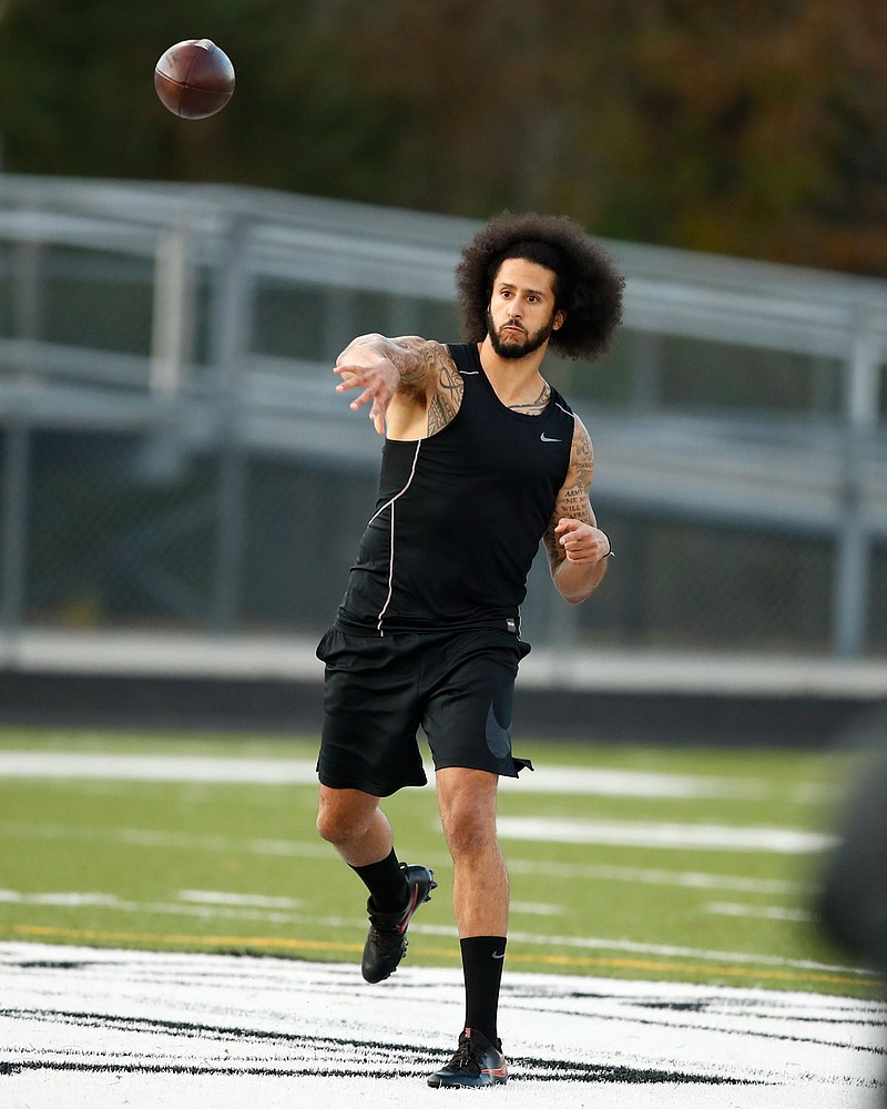 Free agent quarterback Colin Kaepernick participates in a workout for NFL scouts and media Saturday in Riverdale, Ga.