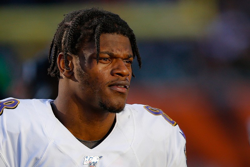 Baltimore Ravens quarterback Lamar Jackson walks the sidelines during the second half of NFL football game against the Cincinnati Bengals, Sunday, Nov. 10, 2019, in Cincinnati. (AP Photo/Gary Landers)