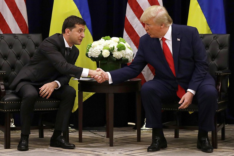 In this Sept. 25, 2019, file photo, President Donald Trump meets with Ukrainian President Volodymyr Zelenskiy at the InterContinental Barclay New York hotel during the United Nations General Assembly in New York. (AP Photo/Evan Vucci, File)