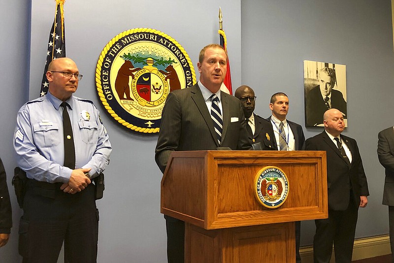 Missouri Attorney General Eric Schmitt announces his support for crime-fighting legislation that will be introduced in January, during a news conference on Tuesday, Nov. 19, 2019 in St. Louis. The legislation calls for tougher laws for carjackers and eliminating the residency requirement for police officers in St. Louis.