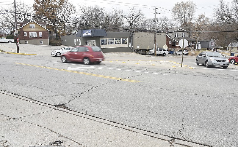 The Jefferson City Council decided in November to hold off on voting to authorize a $250,000 real estate agreement to purchase the property at 1136 E. Dunklin St., the Joshua House Church, shown in background on the corner.