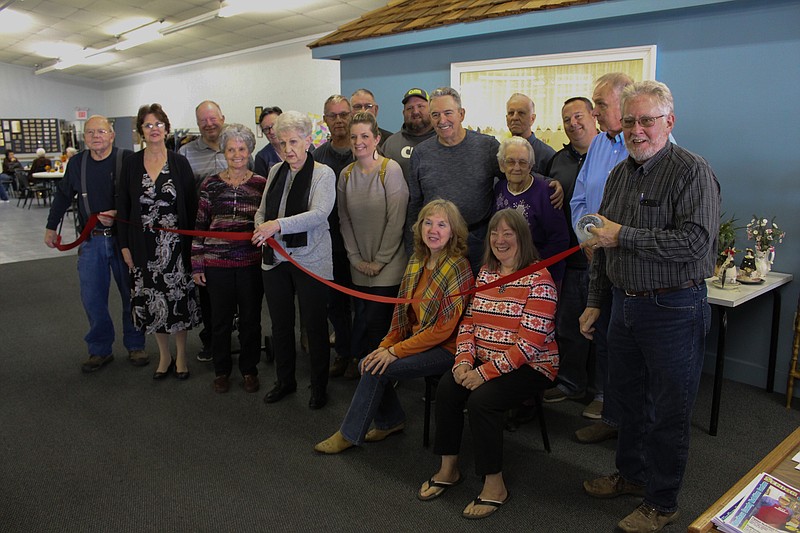 <p>Representatives with the California Area Chamber of Commerce joined with members of the California Nutrition Center’s Board of Directors Nov. 14 to celebrate its newly-constructed office space with a ribbon cutting. The assembled group also recognized Albert Schoeneberg, who singlehandedly constructed the space. Schoeneberg was presented with a plaque, a certificate of recognition and ten free meal vouchers for the Nutrition Center.</p>