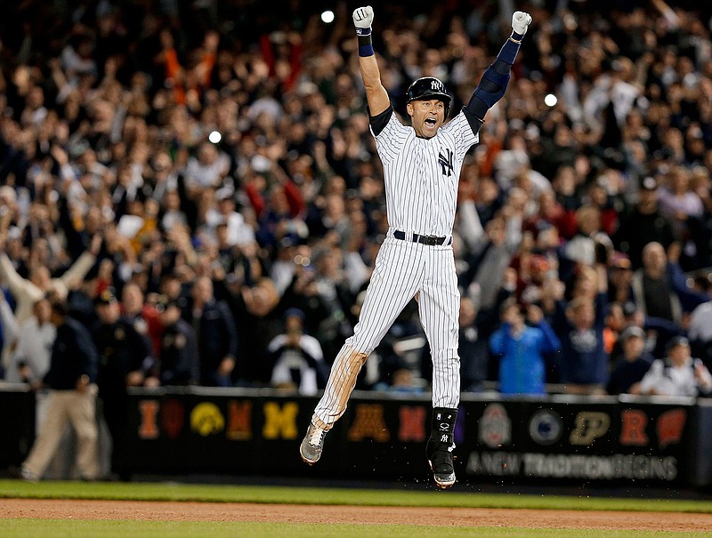  In this Sept. 25, 2014, file photo, New York Yankees' Derek Jeter jumps after hitting the game-winning single against the Baltimore Orioles in the ninth inning of a baseball game, in New York. Derek Jeter is among 18 newcomers on the 2020 Hall of Fame ballot, announced Monday, Nov. 18, 2019, and is likely to be an overwhelming choice to join former New York Yankees teammate Mariano Rivera in Cooperstown after the reliever last year became the first unanimous pick by the Baseball Writers' Association of America. (AP Photo/Julie Jacobson, File)