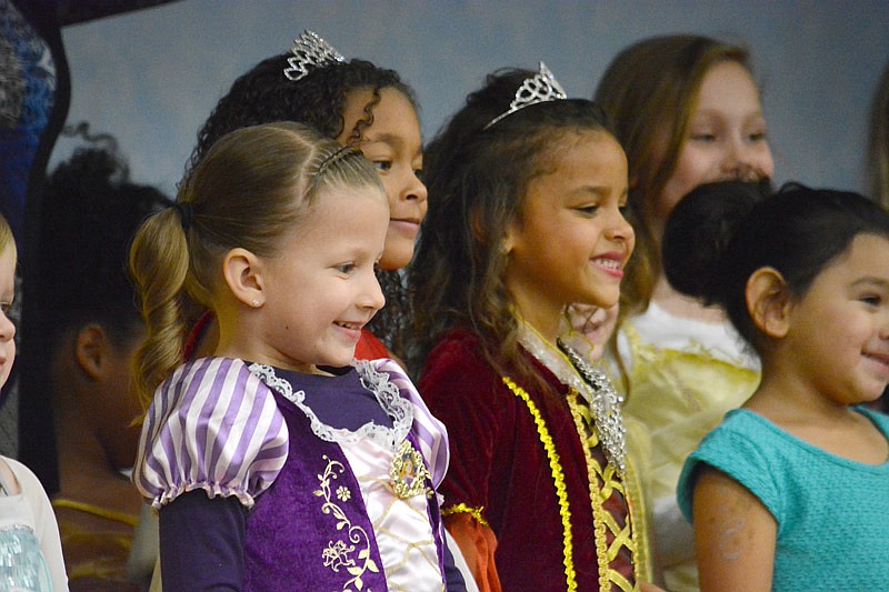 Young princesses gather on stage Saturday, Nov. 17, 2018, during A Princess Party at First United Methodist Church. All proceeds benefit the Little Explorers Discovery Center.