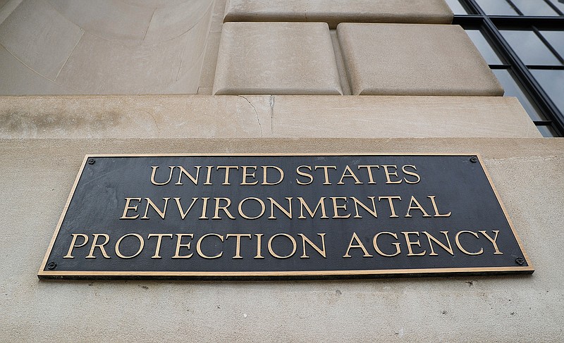 This Sept. 21, 2017 file photo shows the Environmental Protection Agency (EPA) Building in Washington. Criminal prosecution and convictions of polluters haven fallen to quarter-century lows under the Trump administration. That's according to Justice Department figures for fiscal year 2019. The EPA says it's improved in some other enforcement categories. But a former EPA agent in charge says three years of declines show the agency dismantling criminal enforcement. (AP Photo/Pablo Martinez Monsivais)