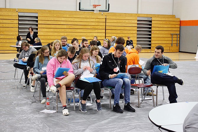 New Bloomfield High School seniors react to the situation they are placed in during the "reactive" session of Thursday's REALL Simulation at NBHS. The simulation is a learning tool for students to understand the impact of life choices. They had a positive simulation and then a negative one surrounded with poverty.