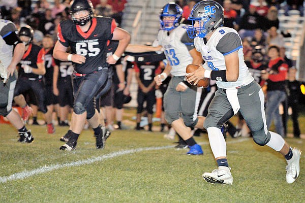 South Callaway quarterback Cole Shoemaker finds room to run during a win last month at Clopton/Elsberry.