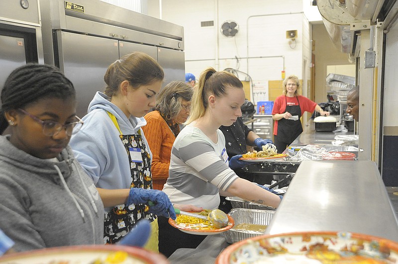 Volunteers at Immaculate Conception Catholic Church served more than 900 meals for members of the community in Kertz Hall and through delivery during this year's Thanksgiving community meal.