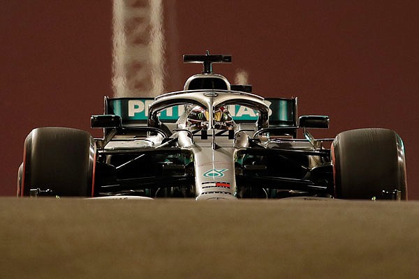 Mercedes driver Lewis Hamilton steers his car during Friday's second practice session at the Yas Marina racetrack in Abu Dhabi, United Arab Emirates.