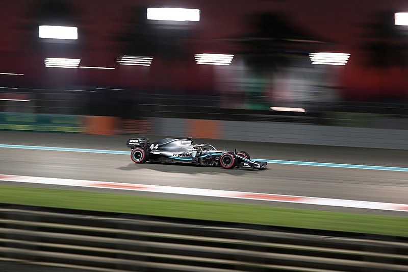 Mercedes driver Lewis Hamilton steers his car during practice Friday at the Yas Marina racetrack in Abu Dhabi, United Arab Emirates.