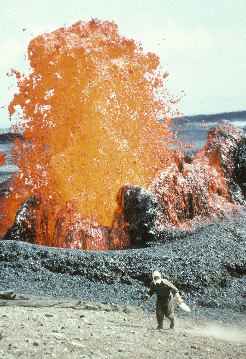 Margaret Mangan, middle, now scientist-in-charge of the USGS California Volcano Observatory, visits the island of Monserrat during a 1997 eruption of the Soufriere Hills Volcano.
(U.S. Geological Survey/TNS)