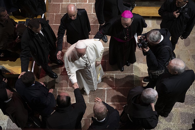 Pope Francis leaves the sanctuary of Greccio, Italy, Sunday, Dec. 1, 2019. Pope Francis on Sunday hailed Nativity scenes as ‘’simple and admirable’’ signs of Christian faith and encouraged their placement in workplaces, schools and town squares, as he bolstered a Christmas tradition that has at times triggered bitter legal battles in the United States.  (AP Photo/Alessandra Tarantino)