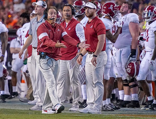 Alabama head coach Nick Saban disagrees with a call in the second half of Saturday's game against Auburn in Auburn, Ala.