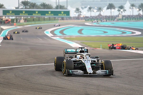 Mercedes driver Lewis Hamilton leads during the Emirates Formula One Grand Prix on Sunday at the Yas Marina racetrack in Abu Dhabi, United Arab Emirates.