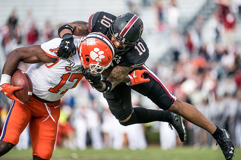 South Carolina defensive back R.J. Roderick (10) tackles Clemson wide receiver Cornell Powell (17) during the second half of an NCAA football game Saturday in Columbia, S.C. Clemson defeated South Carolina, 38-3.