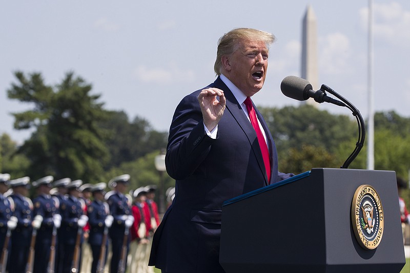 FILE - In this July 25, 2019, file phot, President Donald Trump speaks during a ceremony for new Secretary of Defense Mark Esper at the Pentagon. If there was one day that crystallized all the forces that led to the impeachment investigation of President Donald Trump, it was July 25. That was the day of his phone call with Ukraine’s new leader, pressing him for a political favor.  (AP Photo/Alex Brandon, File)