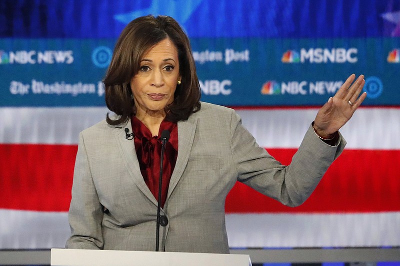FILE - In this Nov. 20, 2019 file photo, Democratic presidential candidate Sen. Kamala Harris, D-Calif., speaks during a Democratic presidential primary debate in Atlanta. Harris, was once considered a front-runner in the crowded Democratic field, is expected to end her campaign for the Democratic presidential nomination, according to a campaign official.. (AP Photo/John Bazemore)