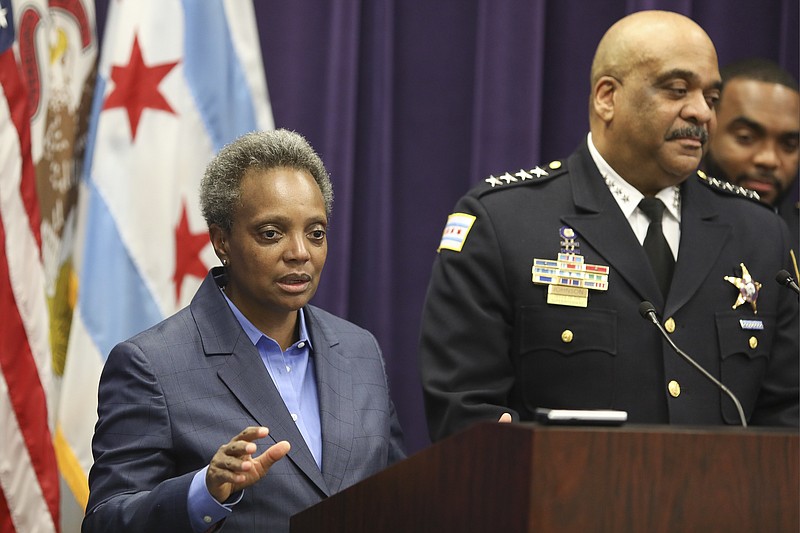 FILE - In this Nov. 7, 2019 file photo, Mayor Lori Lightfoot speaks as Chicago Police Superintendent Eddie Johnson announces his retirement after more than three years leading the department in Chicago. Mayor Lightfoot  fired Police Supt. Eddie Johnson Monday Dec. 2, 2019, due to his "ethical lapses."(AP Photo/Teresa Crawford File)