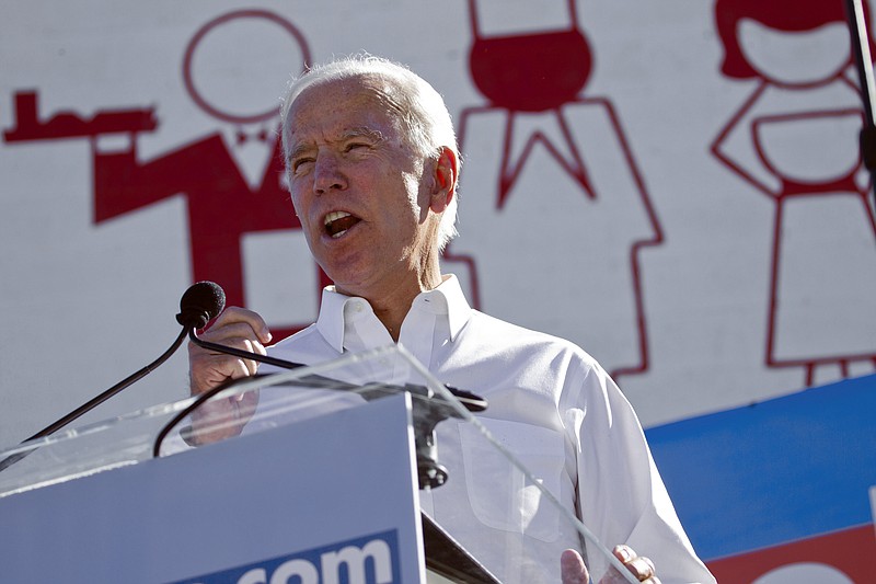 FILE - In this Oct. 20, 2018 file photo, Democratic candidate for president Joe Biden speaks to supporters during a Nevada Democratic Party rally at the Culinary Workers Union Local 226 in downtown Las Vegas. Nevada's powerful casino workers' Culinary Union will hold a series of town halls next week with Democratic presidential candidates Elizabeth Warren, Bernie Sanders and Joe Biden, the group said Tuesday, Dec. 3, 2019. The town halls in Las Vegas on Dec. 9-11 are designed to give the White House hopefuls a chance to pitch themselves to the bartenders, housekeepers and other workers in the city's famed casinos. (Christopher DeVargas/Las Vegas Sun via AP, File)