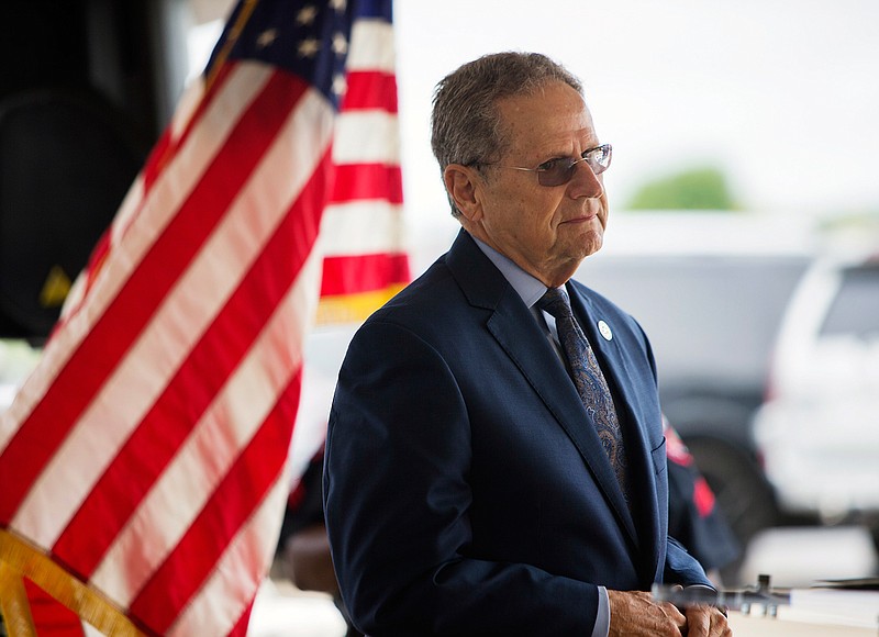 In a Monday, June 17, 2019, photo, state Rep. Rick Miller, R-Sugar Land, stands at a news conference celebrating progress on the Sugar Land 95 Memorial Project in Sugar Land, Texas. Gov. Miller, who suggested his political rivals on the ballot were motivated to run against him because they're Asian, dropped his reelection bid Tuesday, Dec. 3, 2019, following a backlash that included losing the endorsement of the state's GOP governor. (Juan Figueroa/Houston Chronicle via AP)