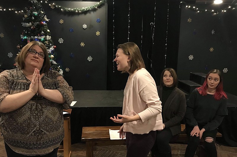 <p>From left, Tracy Wegman, Erin Lammers, Shellie Howser and Hannah Burkybile rehearse “A Man In The House,” an original play by Ben Stumpe that will be shown as part of the “Short Attention Span Theatre: The Holiday Season” at Scene One Theatre. Photo submitted by Mark Wegman</p>