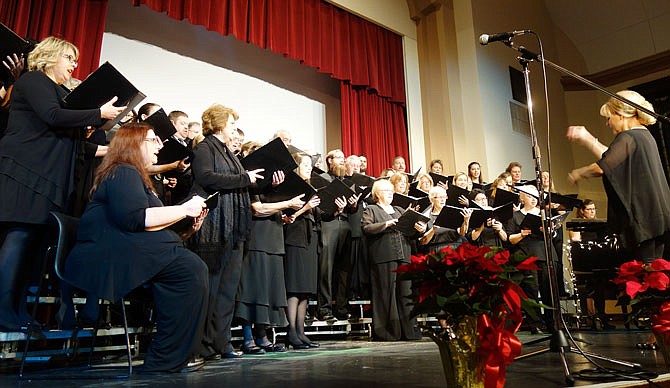 Members of the 50-strong Callaway Singers group launch into their first song at their 2016 Christmas performance. The Callaway Singers will be performing their annual holiday concert tonight and Sunday at William Woods University.