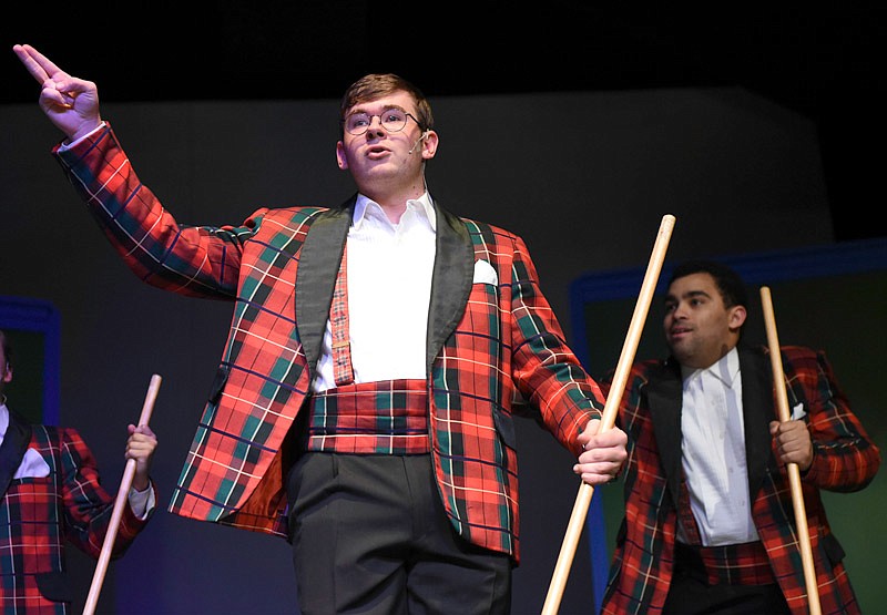 Baylor Webb looks out to the imaginary crowd during rehearsal for Plaid Tidings on Tuesday, Dec. 3, 2019 at Capital City Productions in Jefferson City.