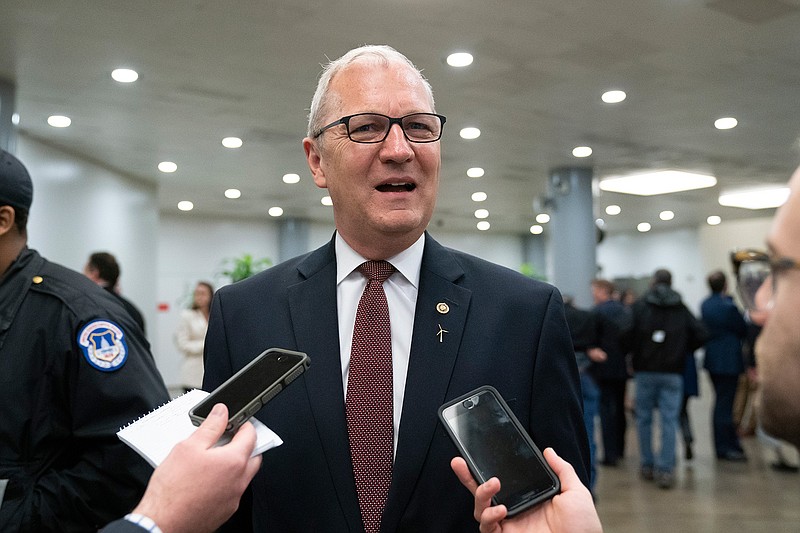 In this April 11, 2019, file photo Sen. Kevin Cramer, R-N.D., speaks to reporters after final votes, at the Capitol in Washington. Cramer has blocked a resolution that would recognize the mass killings of Armenians by Ottoman Turks a century ago as genocide. The Republican senator blocked a Senate vote on the resolution on Thursday, Dec. 5. (AP Photo/J. Scott Applewhite, File)