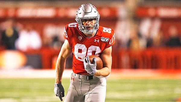 Utah tight end Brant Kuithe carries the ball against Colorado in the first half of last Saturday's game in Salt Lake City.