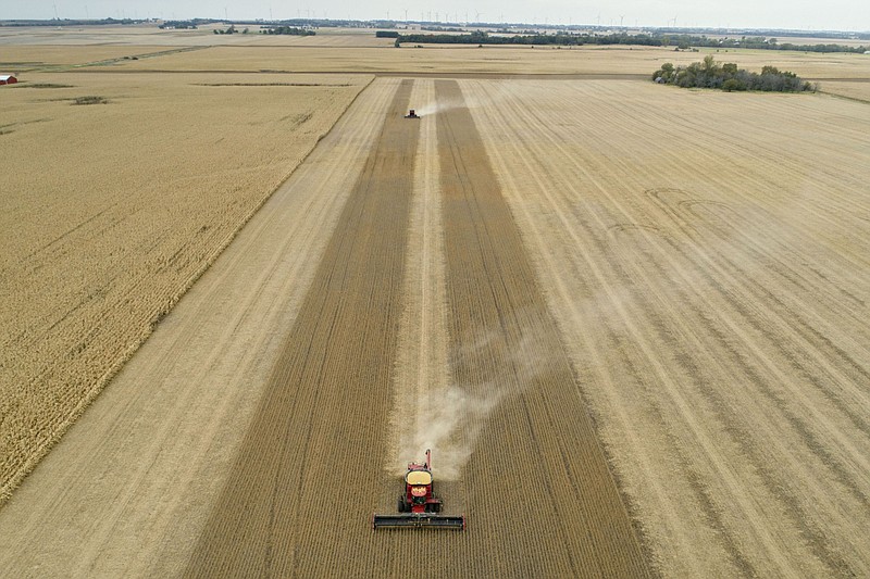 Farmers harvest soybeans in this aerial photograph taken over Wyanet, Ill., on Oct. 19, 2019. (Bloomberg photo by Daniel Acker.)