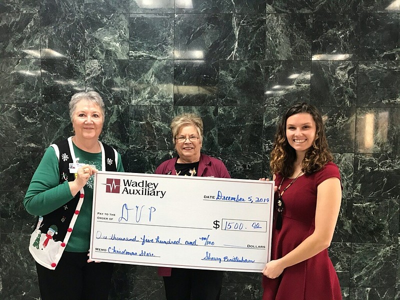 The Wadley Auxiliary recently donated $1,500 to Domestic Violence Prevention, Inc.'s Santa Store program. People who've been a client of DVP in the past year will have the opportunity to choose toys for their child for Christmas through the program. Pictured, from left, are Sherry Brittenham, Wadley Auxiliary president; Karen Ramsey, auxiliary member; and Trinity Gardner, DVP volunteer coordinator. (Submitted photo)
