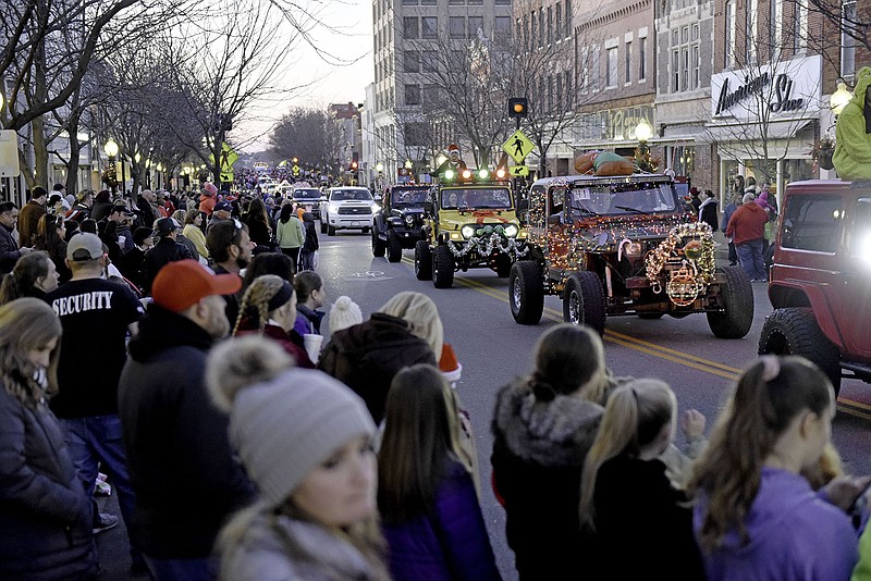 
A line of decorated jeeps parades down the street at the 80th Annual Jefferson City Jaycees Candyland Christmas Parade on Saturday, December 7, 2019 in Jefferson City. The parade went through downtown Jefferson City on High Street and Capital Avenue.