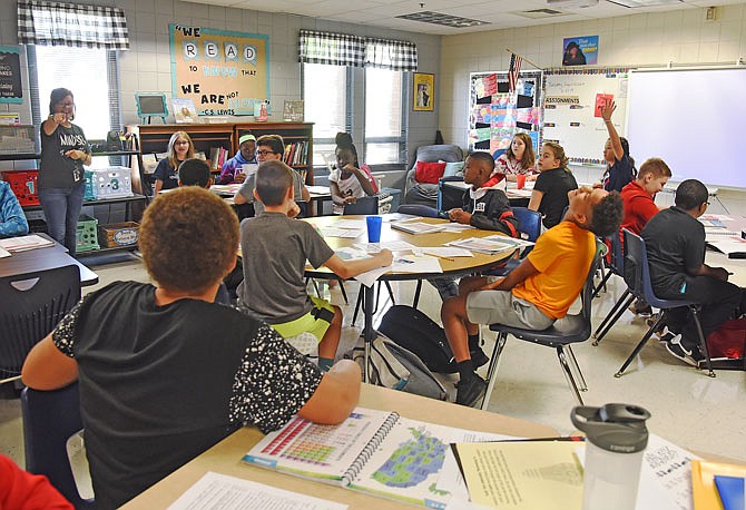 These sixth-graders at Thomas Jefferson Middle School get settled in for their first day of class for this current school year. The Jefferson City School District is considering constructing two intermediate school centers to address overcrowding in the district's K-8 buildings.