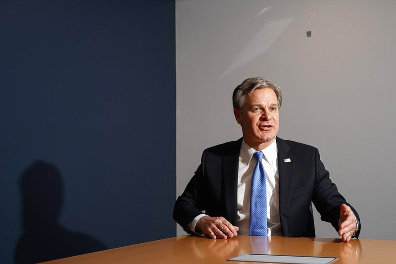 FBI Director Christopher Wray speaks during an interview with The Associated Press, Monday, Dec. 9, 2019, in Washington. Wray says the problems found by the Justice Department watchdog examining the origins of the Russia probe are "unacceptable." (AP Photo/Jacquelyn Martin)