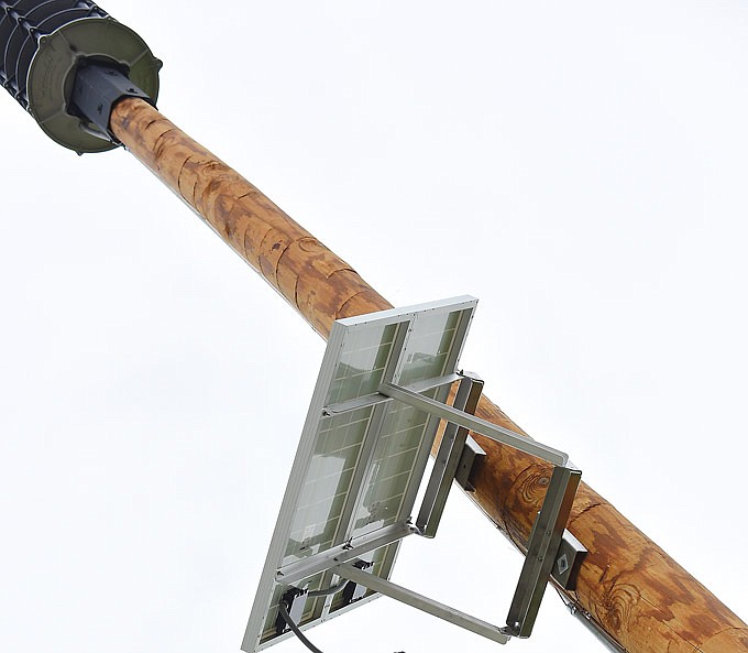 A warning siren and solar panel are perched on a pole in Cole County. (News Tribune file photo)