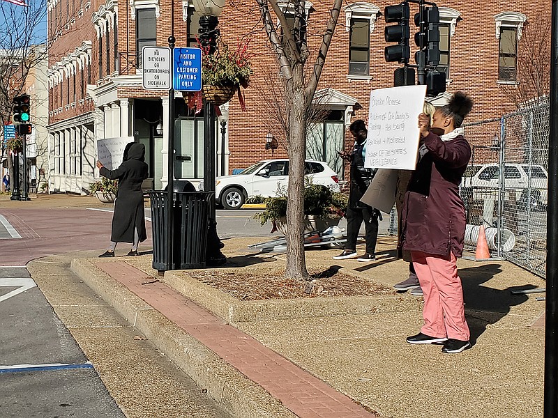 Family and friends of Brandon McNeese protest Wednesday outside of the Cole County Courthouse demanding that authorities come forth with more information about the shooting that occurred on Nov. 25 in the Cole County Jail. Authorities have said they believe McNeese shot himself.