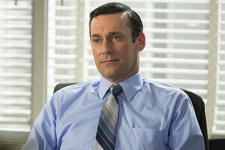 This image released by AMC shows Jon Hamm as Don Draper in a scene from the final season of "Mad Men." AMC took a chance by debuting a '60s period piece set in a New York ad agency filled with guys who took three-martini lunches and had trysts with secretaries. It was "Mad Men" and its anti-hero was the manly, forever mysterious Don Draper, played by Jon Hamm.  (Justina Mintz/AMC via AP)