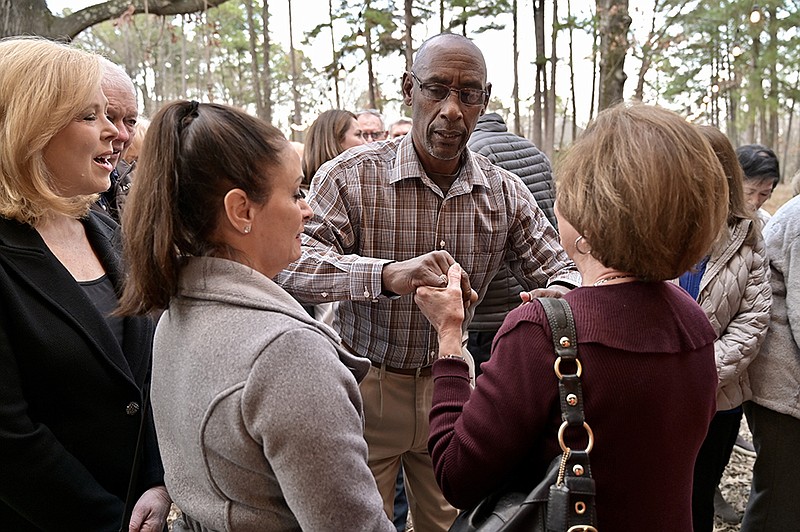 J.J. Jordan tries to remember Alice McMillan's street address, along with everyone else's who came out to celebrate his 39th anniversary with the United States Postal Service on Friday, Dec. 13, 2019, at the Wiggins residence in Texarkana, Texas.