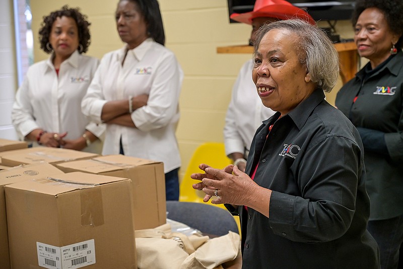 Dr. Teretha Harper speaks Friday to the five Texas school districts that donated more than 10,000 books to the Little Library project at the Southwest Center City in Texarkana, Texas. 