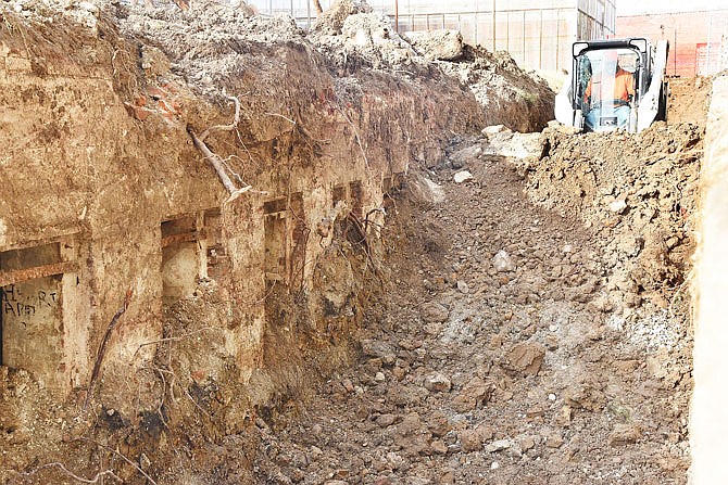 The once-hidden cells at Missouri State Penitentiary have been uncovered by workers from Jeff Schnieders Construction this week. Nick Englert operated the skid steer loader with bucket to clear the pathway to the cells, which are underground between Housing Units 2 and 3. 