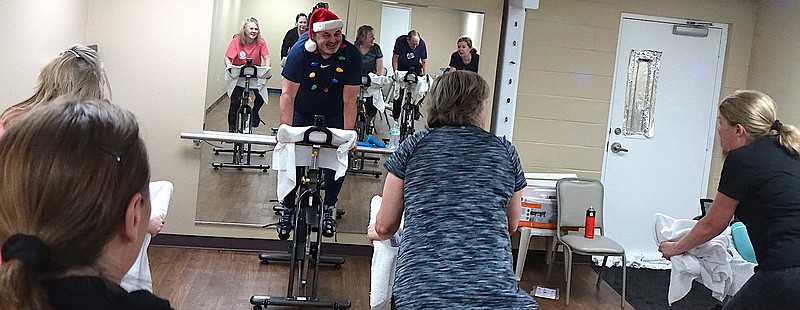  Spinners at CHRISTUS St. Michael Health and Fitness Center are, as reflected in the wall mirror from left, Maye Moore, Kaye Carver, Phil Rice, Karen Willis, Marc Anthony and Lisa Nichols.