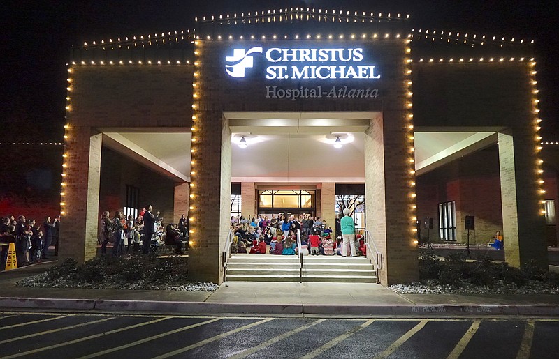 Each December, CHRISTUS St. Michael Hospital-Atlanta hosts a Christmas lighting event that includes the reading of the Christmas story, singing by the Atlanta Elementary choir and the arrival of Santa Claus. Then the lights are turned on, as seen above, which especially dresses up the hospital's front entrance.