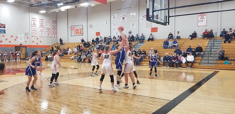 <p>Democrat photo/
Kevin Labotka</p><p style="text-align:right;">Maddie Sedgwick goes up for a shot during the Jamestown Eagles girls team’s game vs. New Bloomfield on Dec. 21.</p>