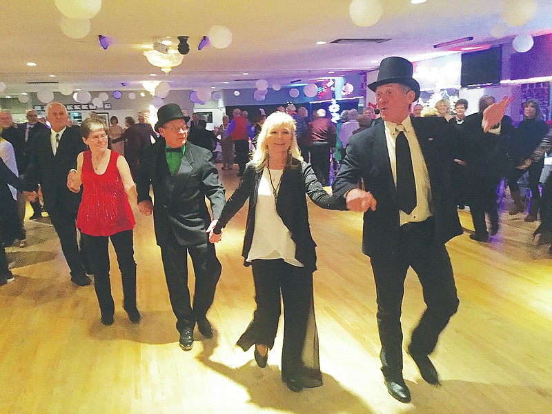 <p style="text-align:right;">News Tribune file</p><p><strong>Tom Cwynar leads New Year’s Eve revelers on the “Grand March” at Capital Ritz during the 2017 New Year’s celebration . Jefferson City and the surrounding Mid-Missouri area has plenty of options for those looking to ring in the New Year in a festive atmosphere.</strong></p>