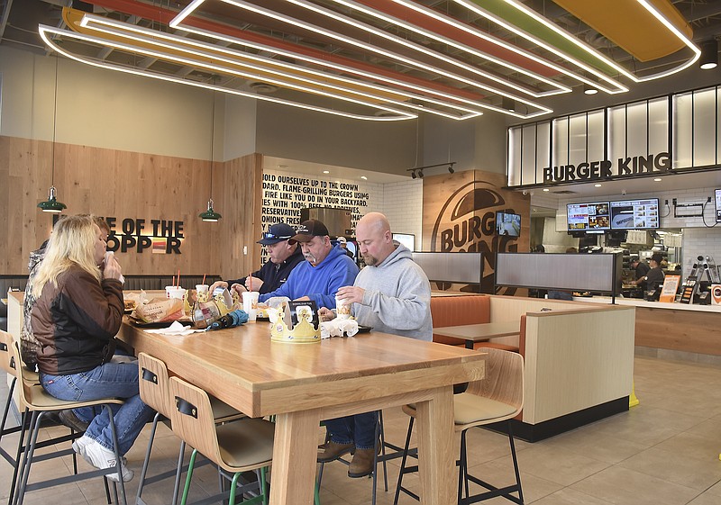Julie Smith/News Tribune
A group of co-workers from Missouri Vocational Enterprises gathered for lunch at the newly-opened Burger King Friday. The second location of the fast-food restaurant opened at the intersection of Missouri Boulevard and Dunklin Street.