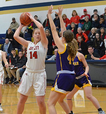 Kara Daly of Jefferson City looks to make a pass to a teammate during Friday's game against Hickman at Rackers Fieldhouse.