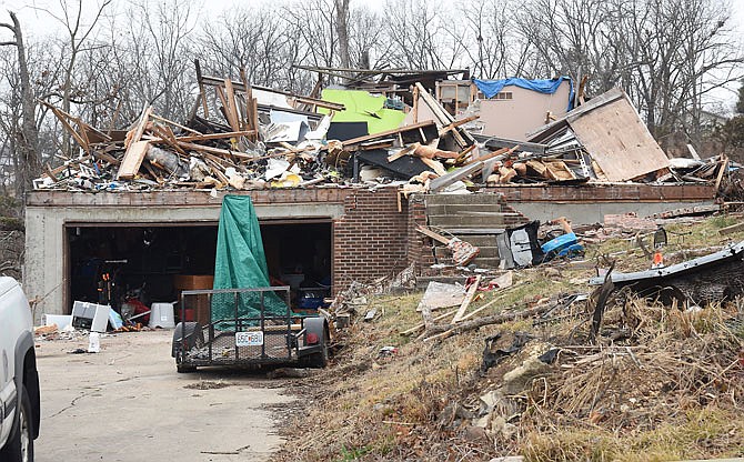 This residence at 510 Holiday Drive has been listed as a dangerous building and has been added to a growing list of Jefferson City buildings deemed unsafe. This is the second one listed as a result of tornado damage.